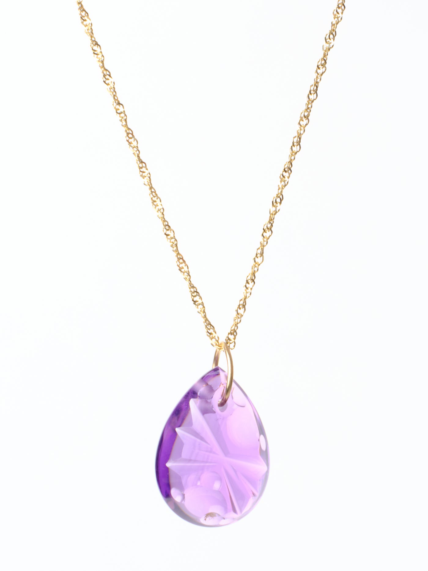 Carved Amethyst Pendant